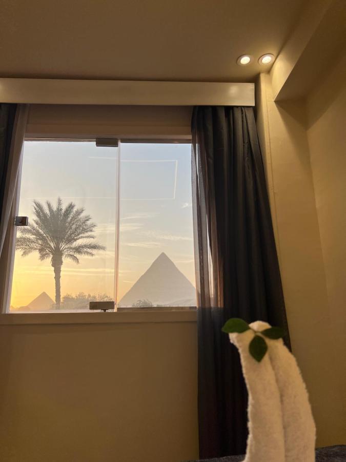 Blue Scarab Pyramids View Hotel Kairo Bagian luar foto