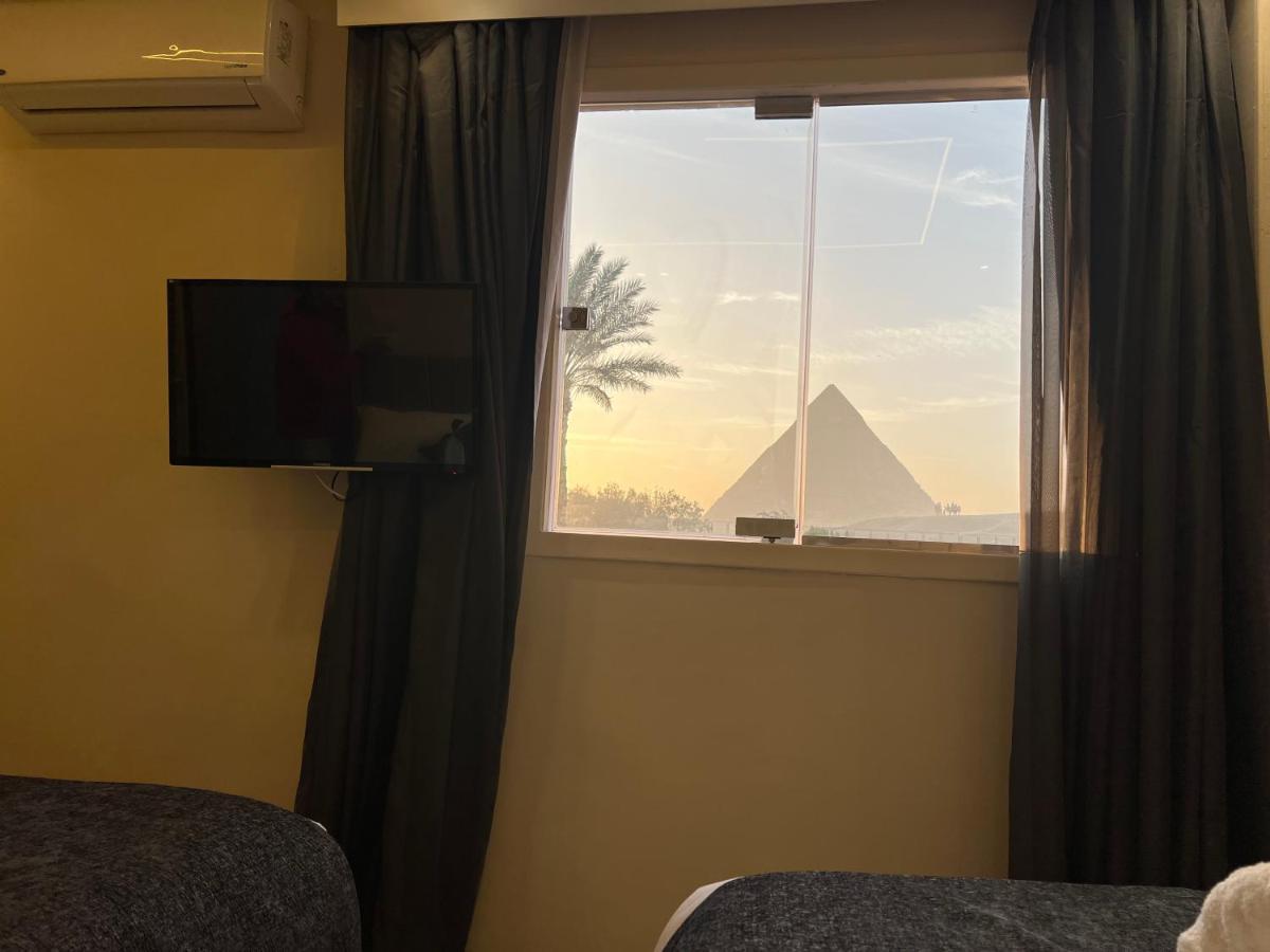 Blue Scarab Pyramids View Hotel Kairo Bagian luar foto